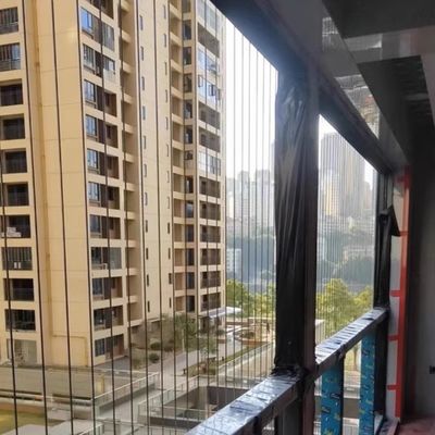 316 ग्रेड स्टील वायर स्ट्रक्चर बालकोन सुरक्षा ग्रिल कटिंग प्रोसेसिंग सेवा के साथ और 316 वायर 3x7 टेफ्लॉन कोटिंग 2.0 मिमी सुरक्षित बाधा प्रदान करता है
